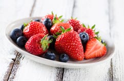 Fresh ripe strawberries and blueberries Royalty Free Stock Photography Fresh ripe strawberries and blueberries Royalty Free Stock Photography