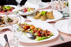 Fresh salad with tomatoes and meat. Delicious prepared and decorated food on table in restaurant. royalty free stock image Fresh salad with tomatoes and meat. Delicious prepared and decorated food on table in restaurant. royalty free stock image
