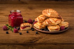Fresh tasty pastries with raspberry jam stock photos Fresh tasty pastries with raspberry jam stock photos