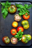 Fresh tomatoes on dark background. Top view Stock Photo Fresh tomatoes on dark background. Top view Stock Photo