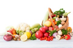 Fresh vegetables and fruit in basket.