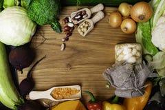 Fresh vegetables and legumes in wooden board. Organic food. Vegan food ingredients. Healthy eating concept royalty free stock photo Fresh vegetables and legumes in wooden board. Organic food. Vegan food ingredients. Healthy eating concept royalty free stock photo