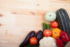 Fresh vegetables lying on a wooden table. Healthy eating. Vegeta Stock Image Fresh vegetables lying on a wooden table. Healthy eating. Vegeta Stock Image