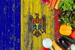 Fresh vegetables from Moldova on table. Cooking concept on wooden flag background stock photos Fresh vegetables from Moldova on table. Cooking concept on wooden flag background stock photos