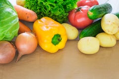 Fresh Vegetables. Tomatoes, Potatoes, Cucumber, Peppers, Onions, Lettuce, Carrots, Cabbage On A Table With Paper Stock Photo Fresh Vegetables. Tomatoes, Potatoes, Cucumber, Peppers, Onions, Lettuce, Carrots, Cabbage On A Table With Paper Stock Photo