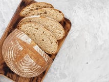Freshly Baked Bread On The Table. Space For Text. The Bread Is Sliced. Top View Stock Photography