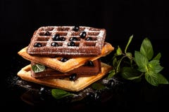 Freshly Baked Viennese Waffles On A Black Table Stock Images