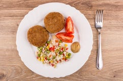 Fried Cutlets With Vegetable Mix, Tomatoes And Mustard In Plate Stock Photos Fried Cutlets With Vegetable Mix, Tomatoes And Mustard In Plate Stock Photos
