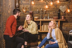 Friends, family spend pleasant evening, interior background. Family enjoy conversation in gamekeepers house. Girls and royalty free stock photography Friends, family spend pleasant evening, interior background. Family enjoy conversation in gamekeepers house. Girls and royalty free stock photography