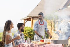 Friends having a barbecue party stock photography Friends having a barbecue party stock photography