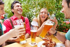 Friends Having Fun In Beer Garden Royalty Free Stock Images Friends Having Fun In Beer Garden Royalty Free Stock Images