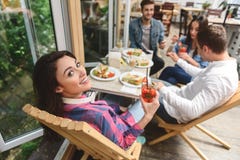 Friends having fun during lunch together stock photography Friends having fun during lunch together stock photography