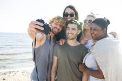 Friends taking selfie on beach royalty free stock images Friends taking selfie on beach royalty free stock images