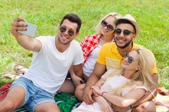 Friends taking selfie photo smart phone picnic countryside young people stock image Friends taking selfie photo smart phone picnic countryside young people stock image