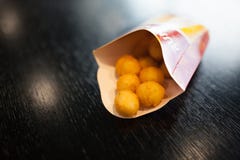 Fries, round, rural, in bag, on table in cafe royalty free stock photo Fries, round, rural, in bag, on table in cafe royalty free stock photo