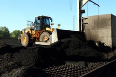 Front End Loader Moving Piles Of Coal Royalty Free Stock Image Front End Loader Moving Piles Of Coal Royalty Free Stock Image