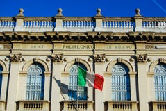 Front of Polytechnic University building of Milan with italian flag stock image Front of Polytechnic University building of Milan with italian flag stock image