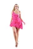Front view of blonde woman in fringed dress walking and looking at camera royalty free stock images Front view of blonde woman in fringed dress walking and looking at camera royalty free stock images