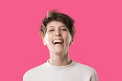 Front view of extremely happy and laughing young girl. Cute stylish model stock photography Front view of extremely happy and laughing young girl. Cute stylish model stock photography
