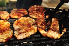 Front View Of A Chicken Breast On A Grill Front View Of A Chicken Breast On A Grill