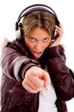 Front View Of Pointing Woman Enjoying Music Royalty Free Stock Photos Front View Of Pointing Woman Enjoying Music Royalty Free Stock Photos