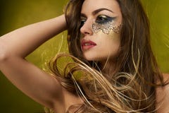 Fronte della ragazza s con trucco fantastico fotografia stock libera da diritti Fronte della ragazza s con trucco fantastico fotografia stock libera da diritti