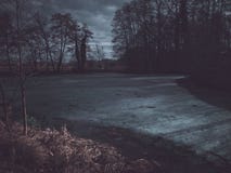 Frozen lake at night reflecting moonlight Royalty Free Stock Photos Frozen lake at night reflecting moonlight Royalty Free Stock Photos