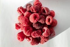 Frozen Raspberries against a white background royalty free stock photo Frozen Raspberries against a white background royalty free stock photo