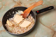 Frying Onion. Add Butter In Minced Onion. Stock Image Frying Onion. Add Butter In Minced Onion. Stock Image