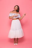 Full length portrait of excited european woman 20s in beautiful Stock Photography Full length portrait of excited european woman 20s in beautiful Stock Photography