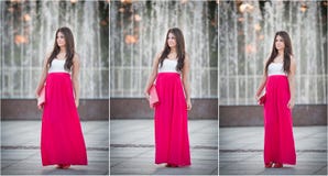 Full length of young Caucasian female with long red skirt standing near fountain. Romantic portrait of the woman Royalty Free Stock Photos Full length of young Caucasian female with long red skirt standing near fountain. Romantic portrait of the woman Royalty Free Stock Photos