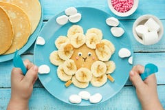 Fun animal shaped pancake with banana, sheep pancake Stock Image Fun animal shaped pancake with banana, sheep pancake Stock Image