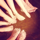Fun Istagram Of Family Feet In Water Splashing Royalty Free Stock Images Fun Istagram Of Family Feet In Water Splashing Royalty Free Stock Images