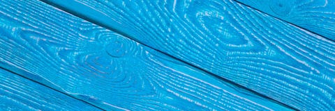 Fundo das placas de madeira da textura pintadas com pintura azul brilhante diagonal natalia imagem de stock Fundo das placas de madeira da textura pintadas com pintura azul brilhante diagonal natalia imagem de stock