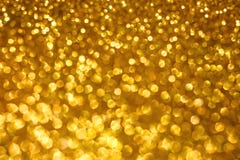Fundo do bokeh do sumário do feriado do Natal com luzes do ouro Fundo do bokeh do brilho imagem de stock royalty free Fundo do bokeh do sumário do feriado do Natal com luzes do ouro Fundo do bokeh do brilho imagem de stock royalty free