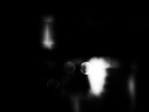 Fundo obscuro do bokeh em preto e branco imagem de stock royalty free Fundo obscuro do bokeh em preto e branco imagem de stock royalty free