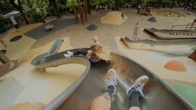 Funny adventures on playground slide
