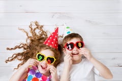 Funny Children Hold 2018 Shaped Candles Stock Photos