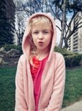 Girl child making funny silly faces with duck lips. stock images Girl child making funny silly faces with duck lips. stock images