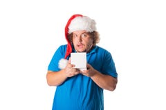 Funny fat man in Santa hat with gifts. Christmas and presents stock images Funny fat man in Santa hat with gifts. Christmas and presents stock images