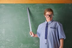 Funny kid girl at school teacher costume royalty free stock image Funny kid girl at school teacher costume royalty free stock image
