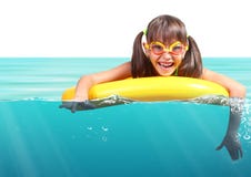 Funny little girl with diving glasses floating inflatable ring, stock image Funny little girl with diving glasses floating inflatable ring, stock image