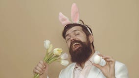 Funny man wear bunny costume accessory. Funny Easter bunny or rabbit. Happy Easter.