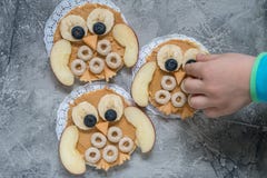 Funny Owl With Peanut Butter And Fruits On Rice Cake Royalty Free Stock Photography