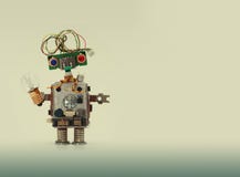 Futuristic robot concept with electrical wire hairstyle. Circuits socket chip toy mechanism, funny head, colored blue Stock Images Futuristic robot concept with electrical wire hairstyle. Circuits socket chip toy mechanism, funny head, colored blue Stock Images