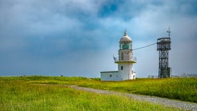 Fyr med ett underbart naturligt landskap arkivfoto Fyr med ett underbart naturligt landskap arkivfoto