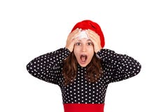 Förvånad chockad härlig kvinna i klänningen som ser kameran emotionell flicka i den Santa Claus julhatten som isoleras på vita lo arkivbilder Förvånad chockad härlig kvinna i klänningen som ser kameran emotionell flicka i den Santa Claus julhatten som isoleras på vita lo arkivbilder