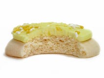 Galleta del limón con la mordedura sacada Imagen de archivo libre de regalías Galleta del limón con la mordedura sacada Imagen de archivo libre de regalías