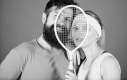 This game is more than hobby. Healthy lifestyle concept. Man and woman couple in love with tennis racket sport equipment stock photos This game is more than hobby. Healthy lifestyle concept. Man and woman couple in love with tennis racket sport equipment stock photos