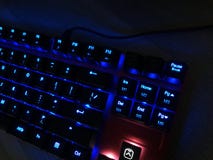 The gaming keyboard shines with multi-colored keys for the convenience of players. royalty free stock photos The gaming keyboard shines with multi-colored keys for the convenience of players. royalty free stock photos